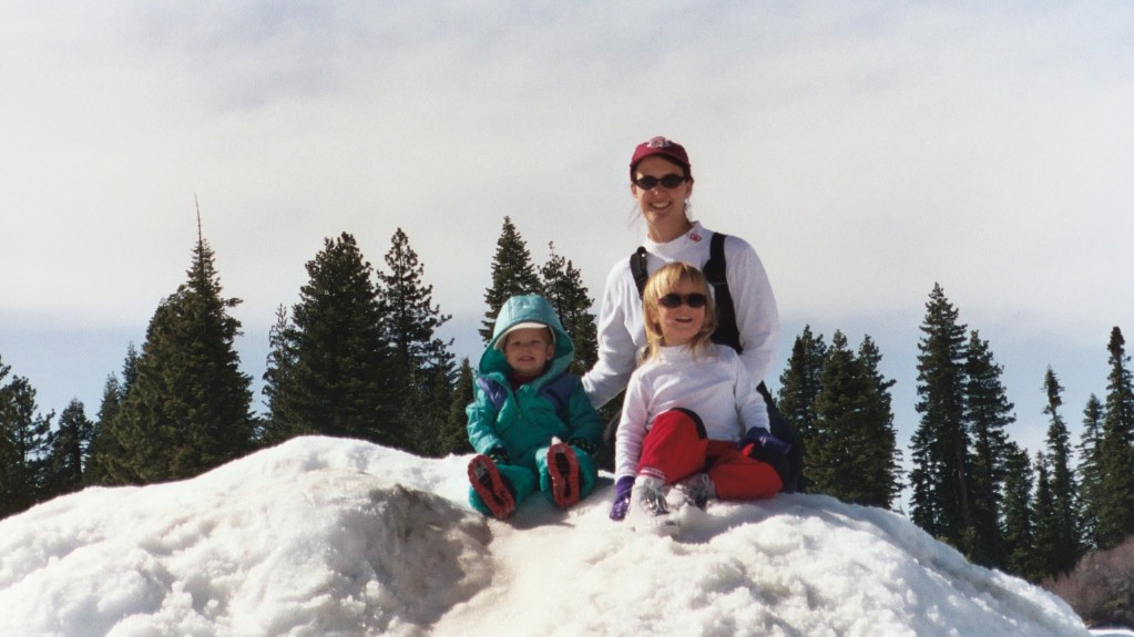 Christy, Emma, and Atticus on a Snow Mound